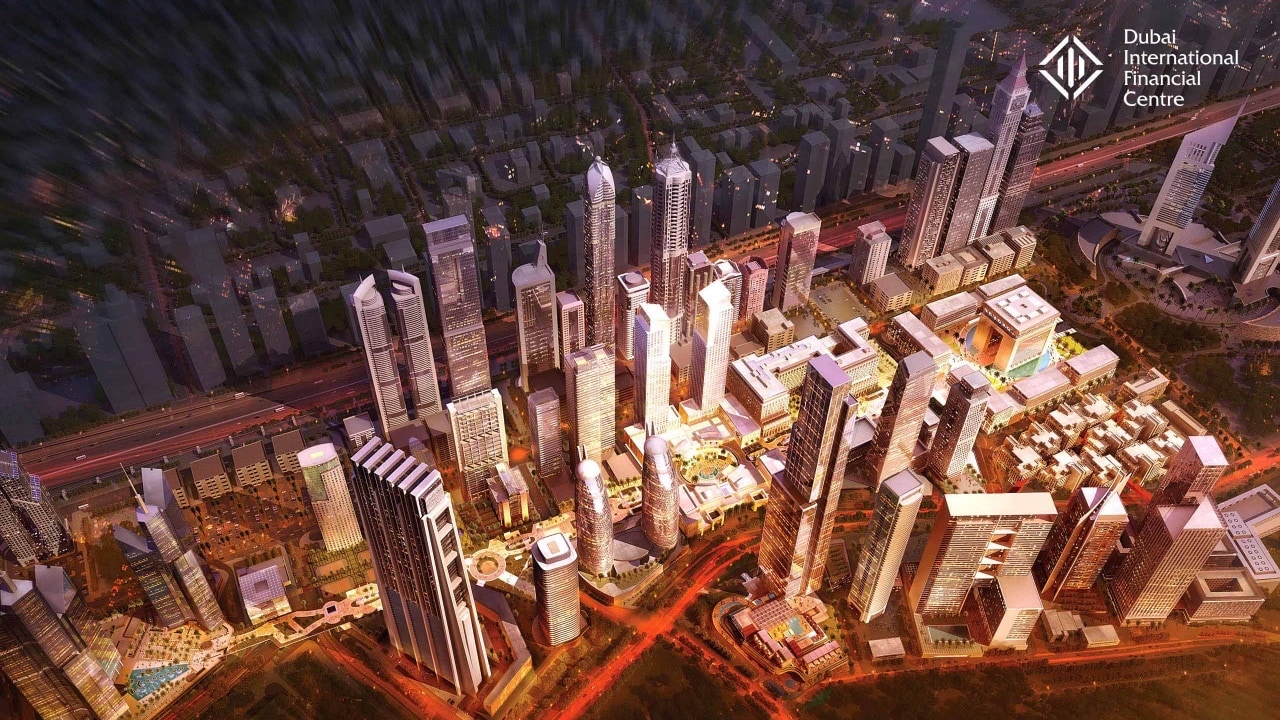 An aerial view of a city at night in a trade show environment.