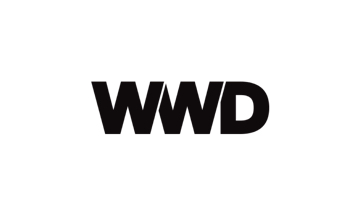 A black and white logo with the word wwd.