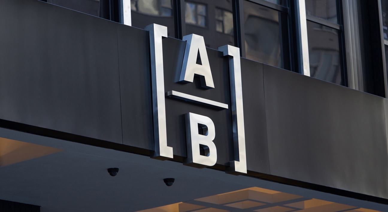the new AB (AllianceBernstein) logo on the main facade of a building