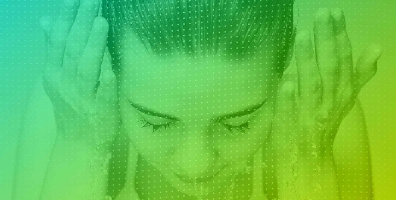 A woman's face with a green and yellow background.