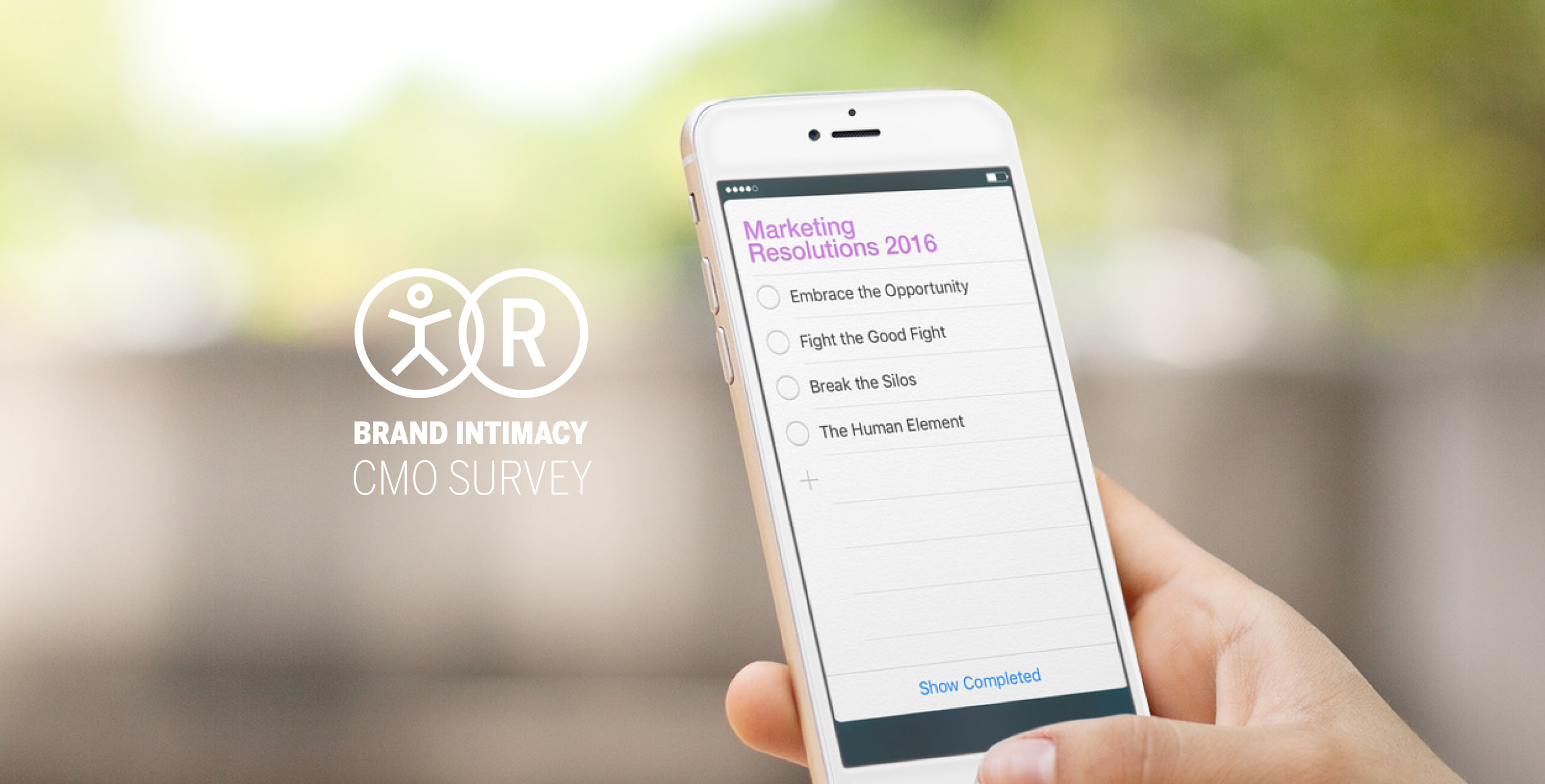 A person is holding up a cell phone with an app on it.