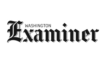 The washington examiner logo on a white background.