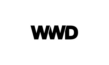 A black and white logo with the word wwd.