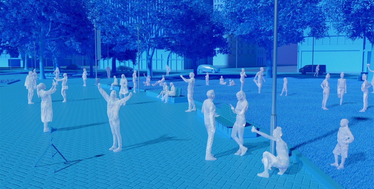 A blue image of people in a park.
