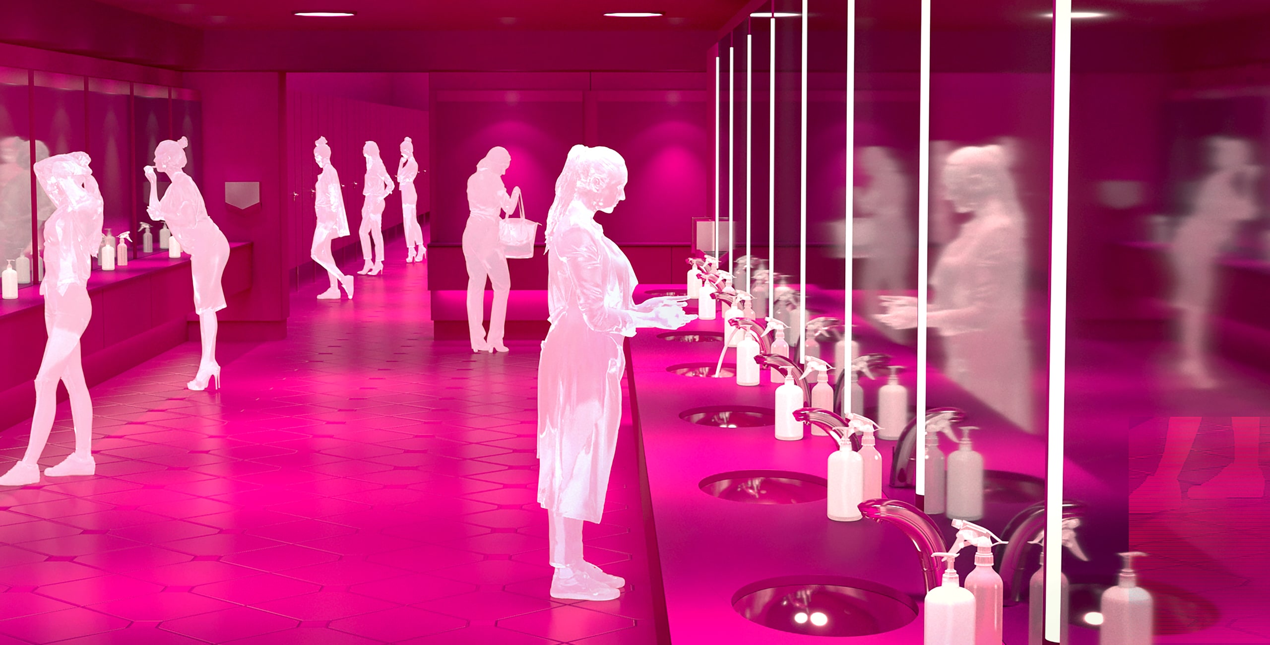 A pink bathroom with a lot of mirrors.