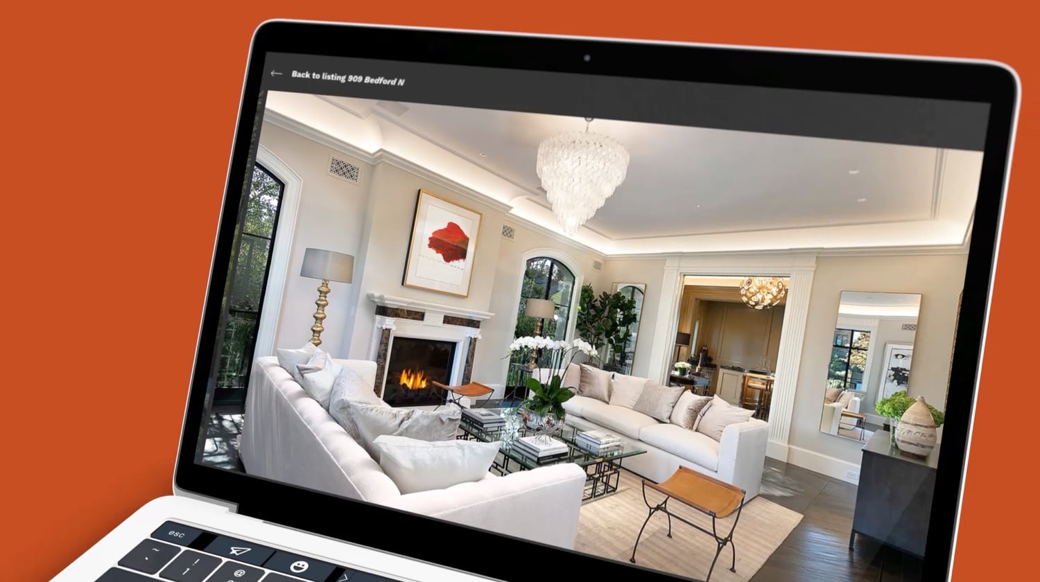 An image of a laptop screen showing a living room.