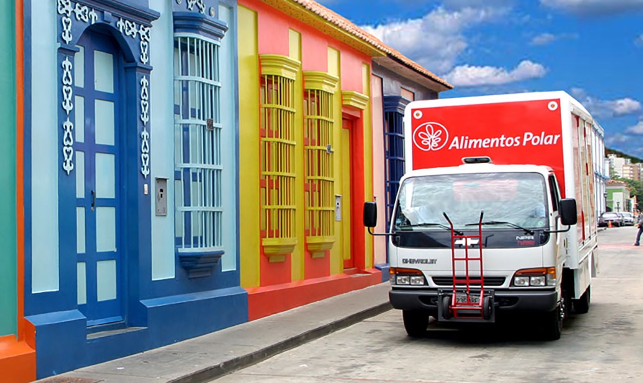 A Polar truck driving down a street.