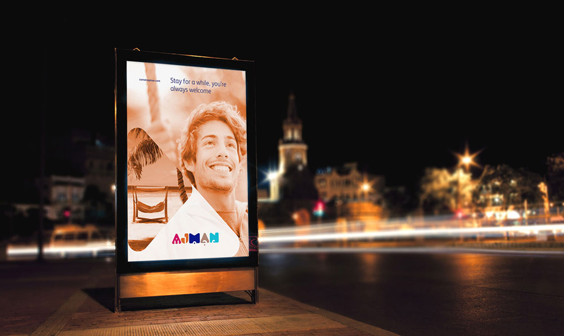 A billboard with a picture of a man and a woman.