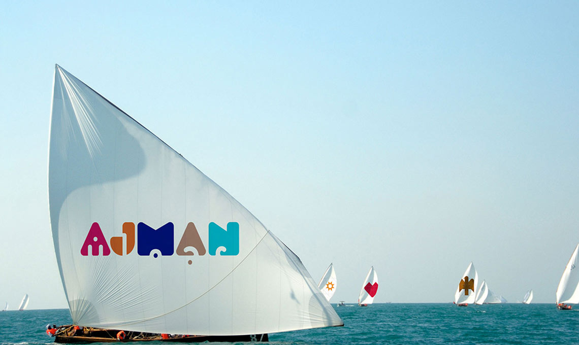 A group of sailboats in the ocean.