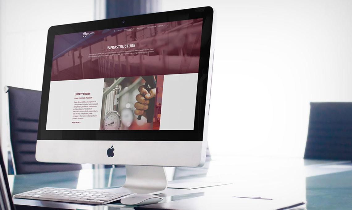 A desktop computer with the website designed for Elwan Group