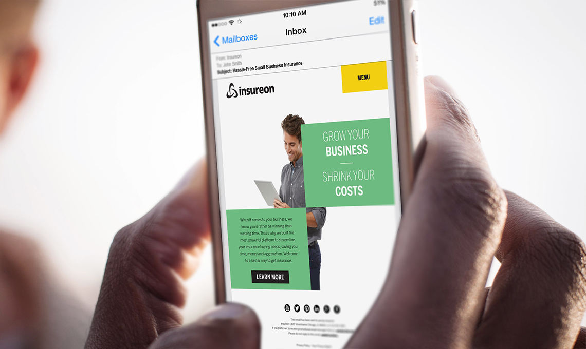 A person displaying brand presence through a smartphone showcasing a website.