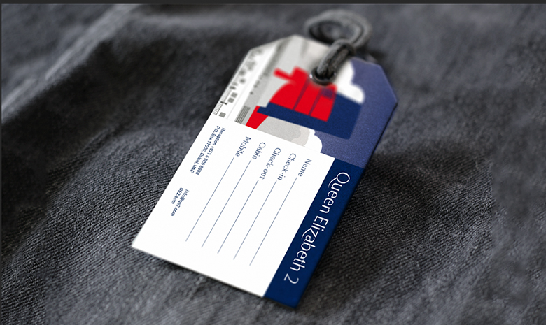 a close up of a luggage tag on a bag designed for QE2