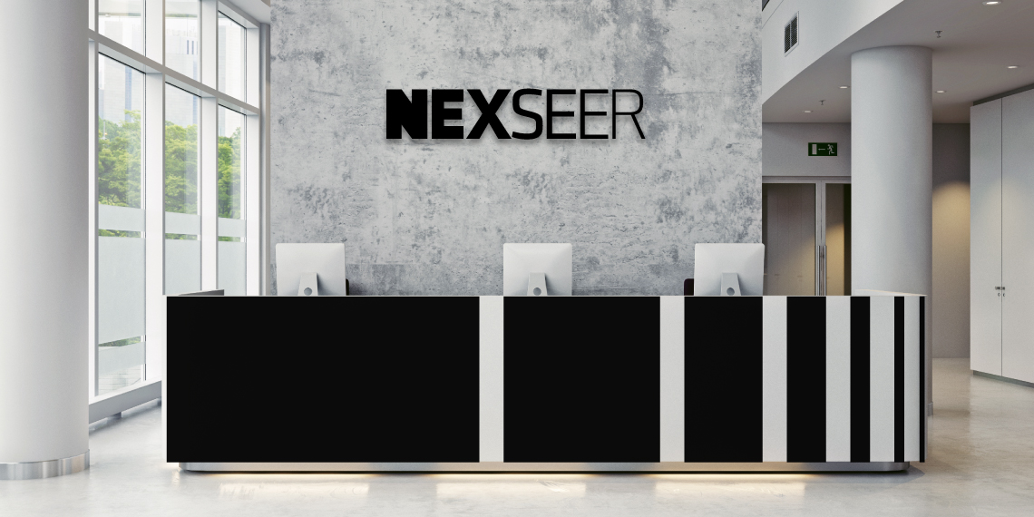 example of the logo applied on a wall in the office reception area