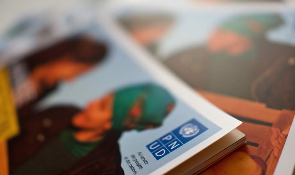 A collateral depicting a woman in a green hat showcased in a magazine.