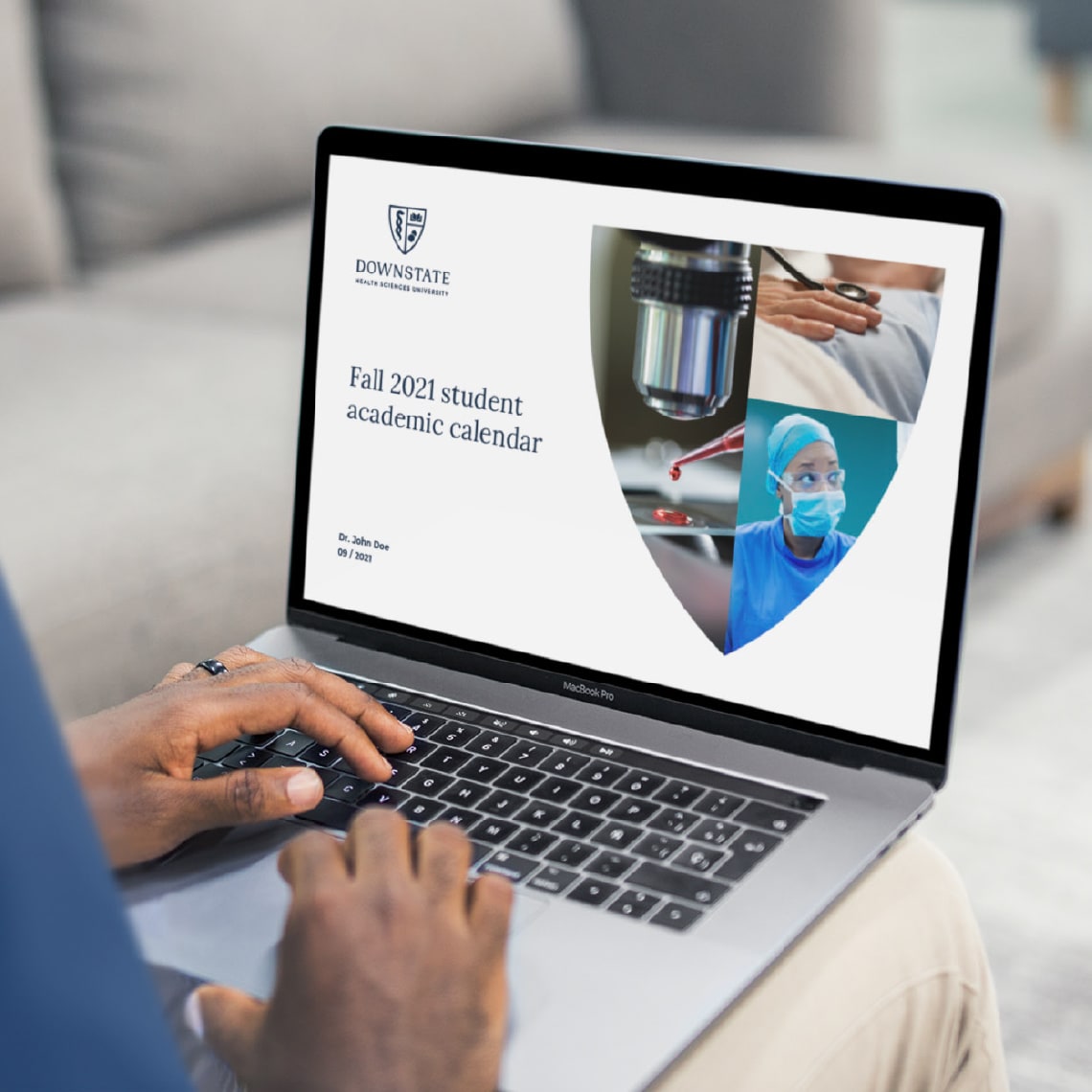 A laptop computer showing a presentation template designed for SUNY