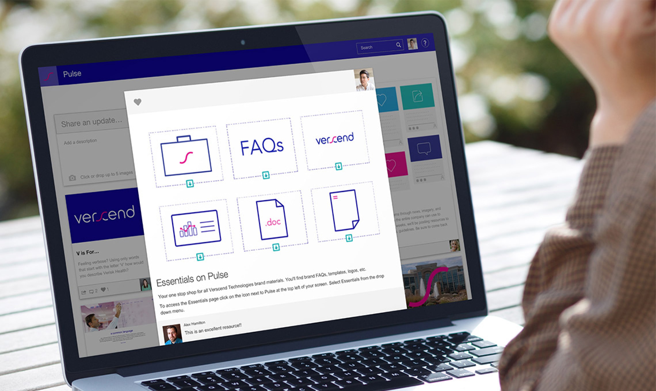 A woman is managing a brand on her laptop screen.