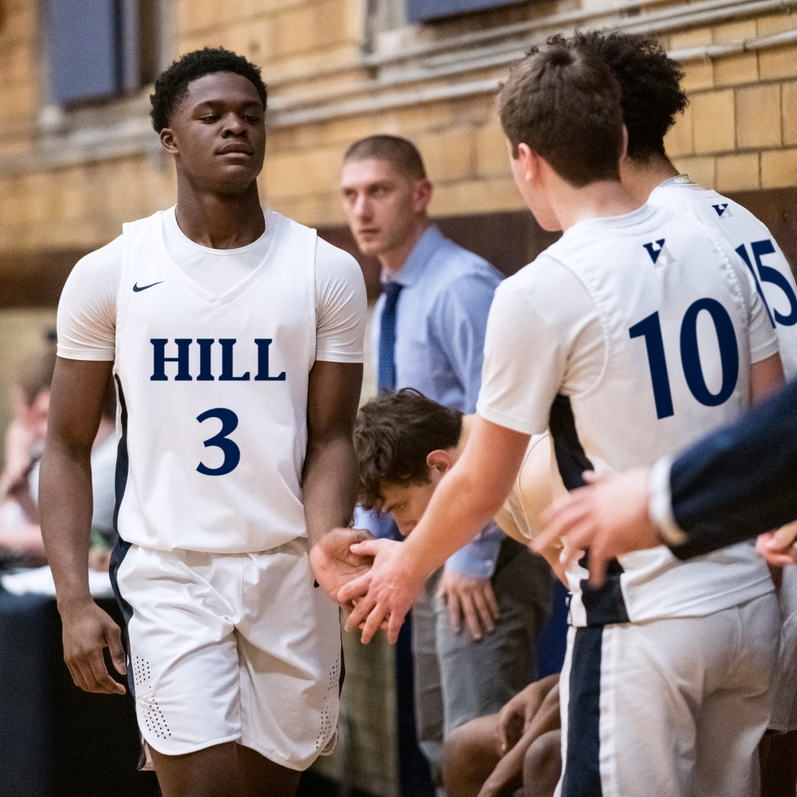 a group of boys in sportswear with the complementary logos