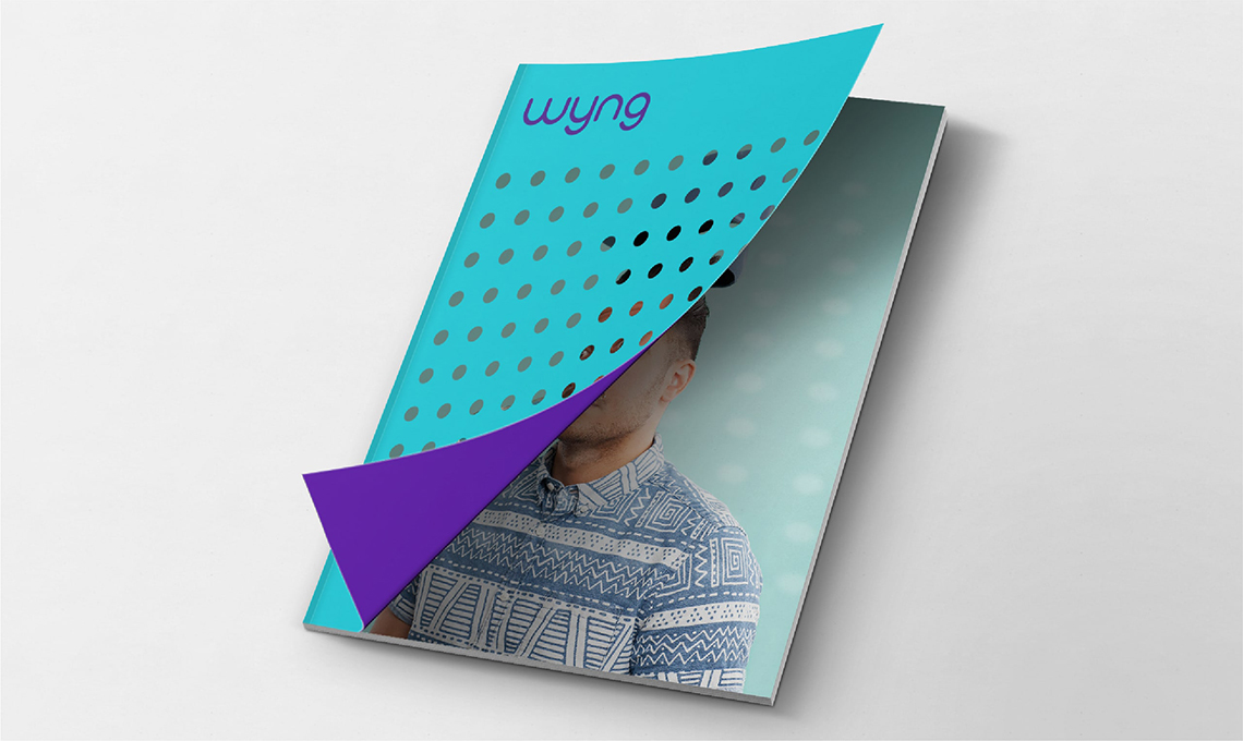 The cover of a magazine with a picture of a man.