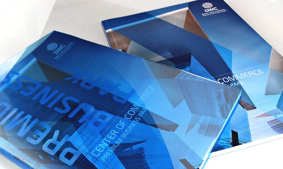 Two marketing materials on a white surface.