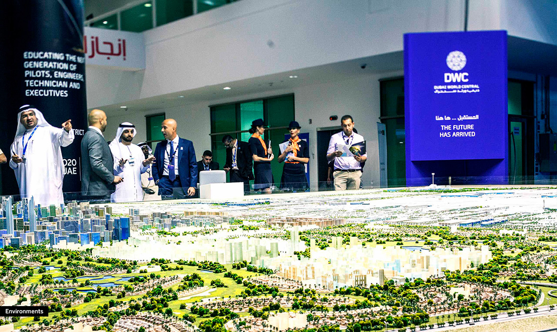 People integrated in a model of a city.