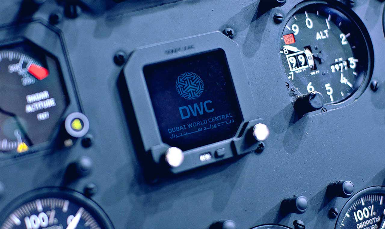 A close up of a cockpit with a number of gauges undergoing market reentry.