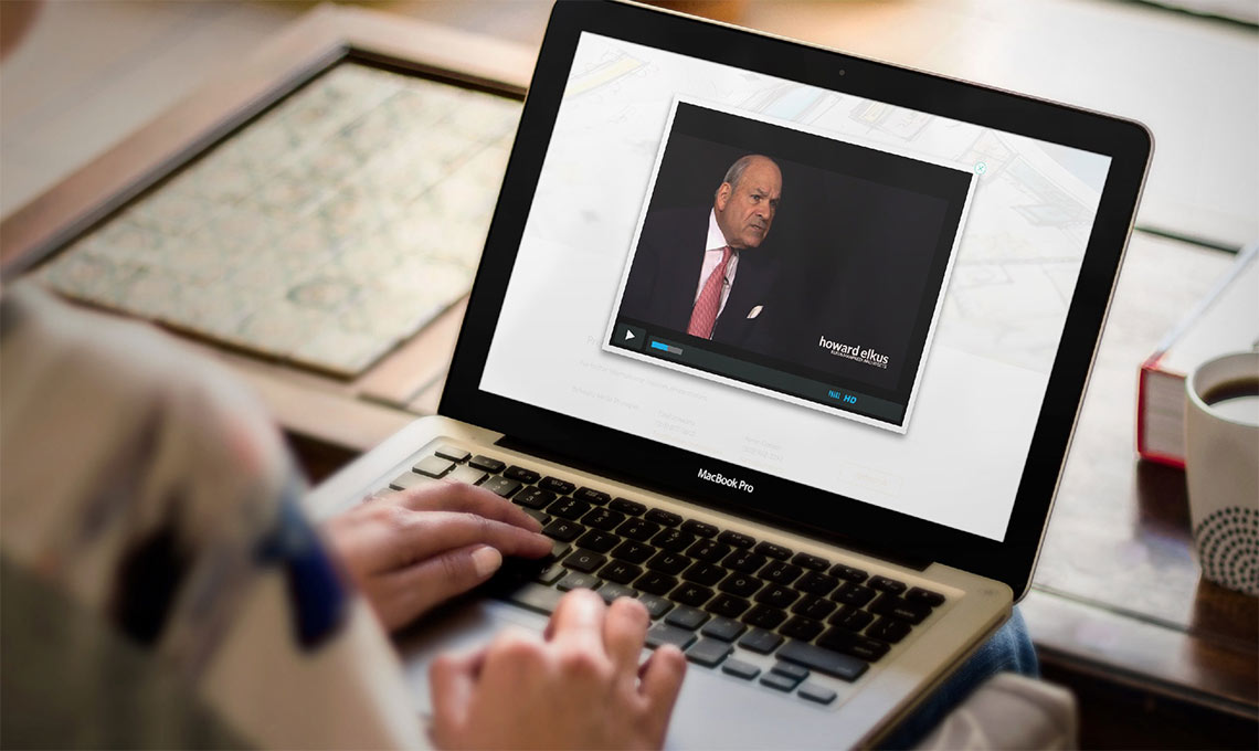 A person is using a laptop with digital tools for a new urban destination.