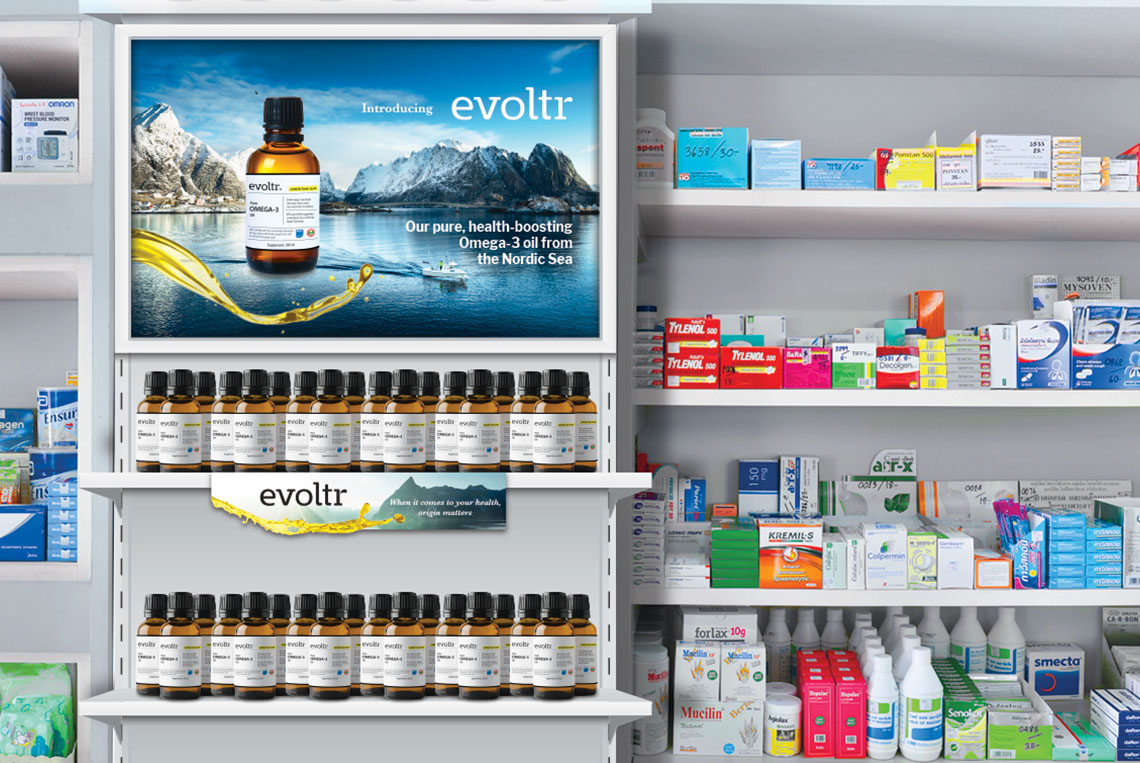a pharmacy store with branded shelves filled with evoltr.