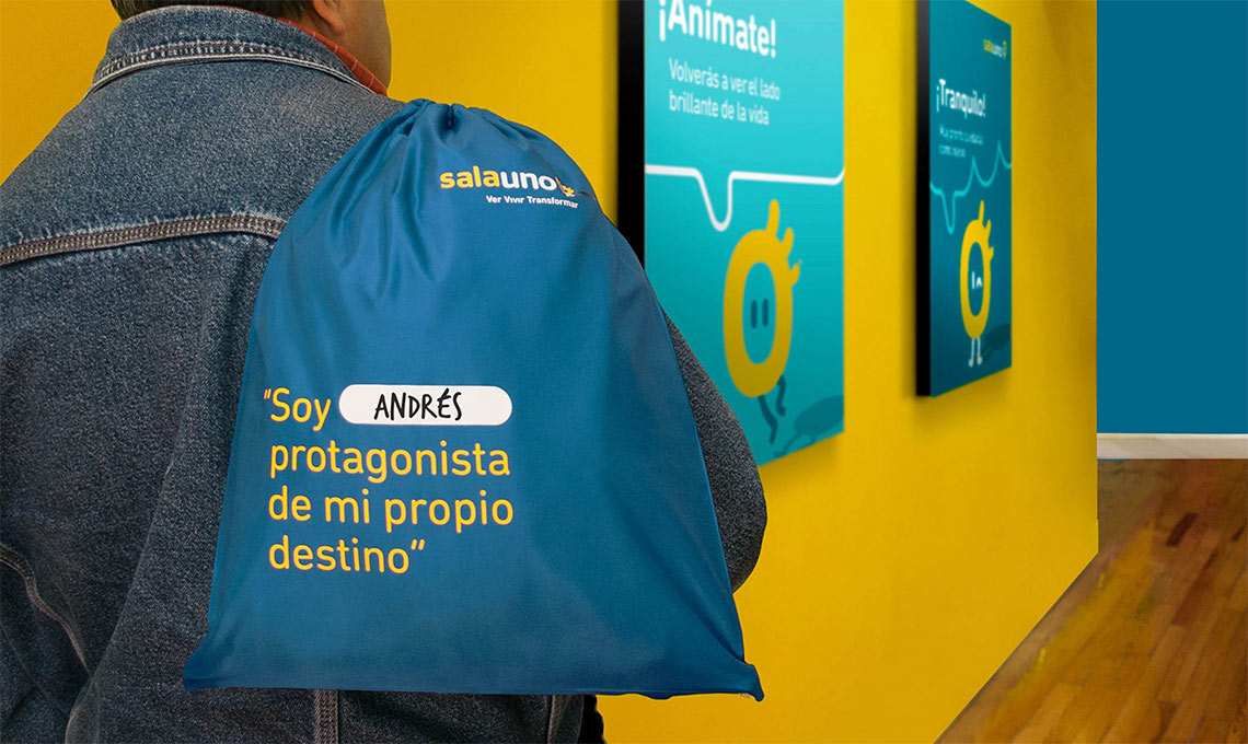 A man is redefining the experience by carrying a bag.