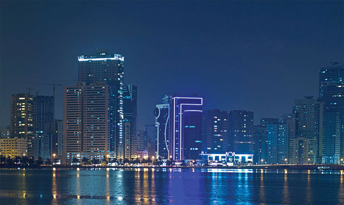 A city skyline at night.