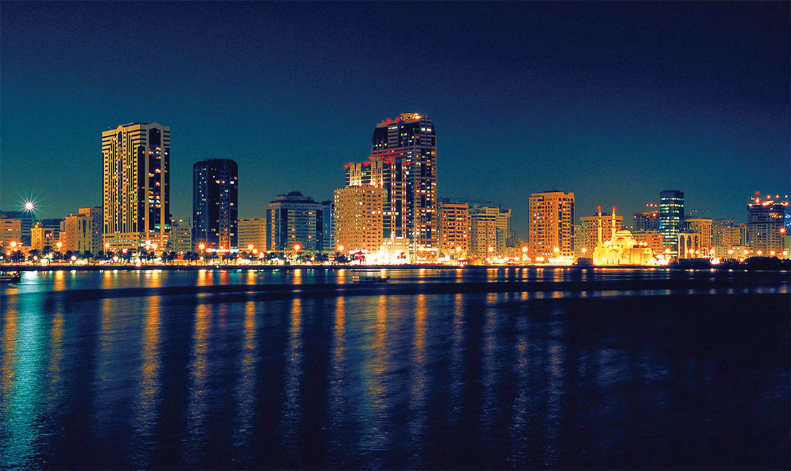 A city skyline at night.