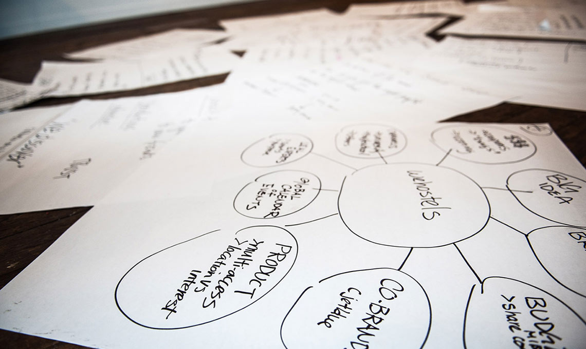 A mobile app displaying a pile of paper with a lot of writing on it.