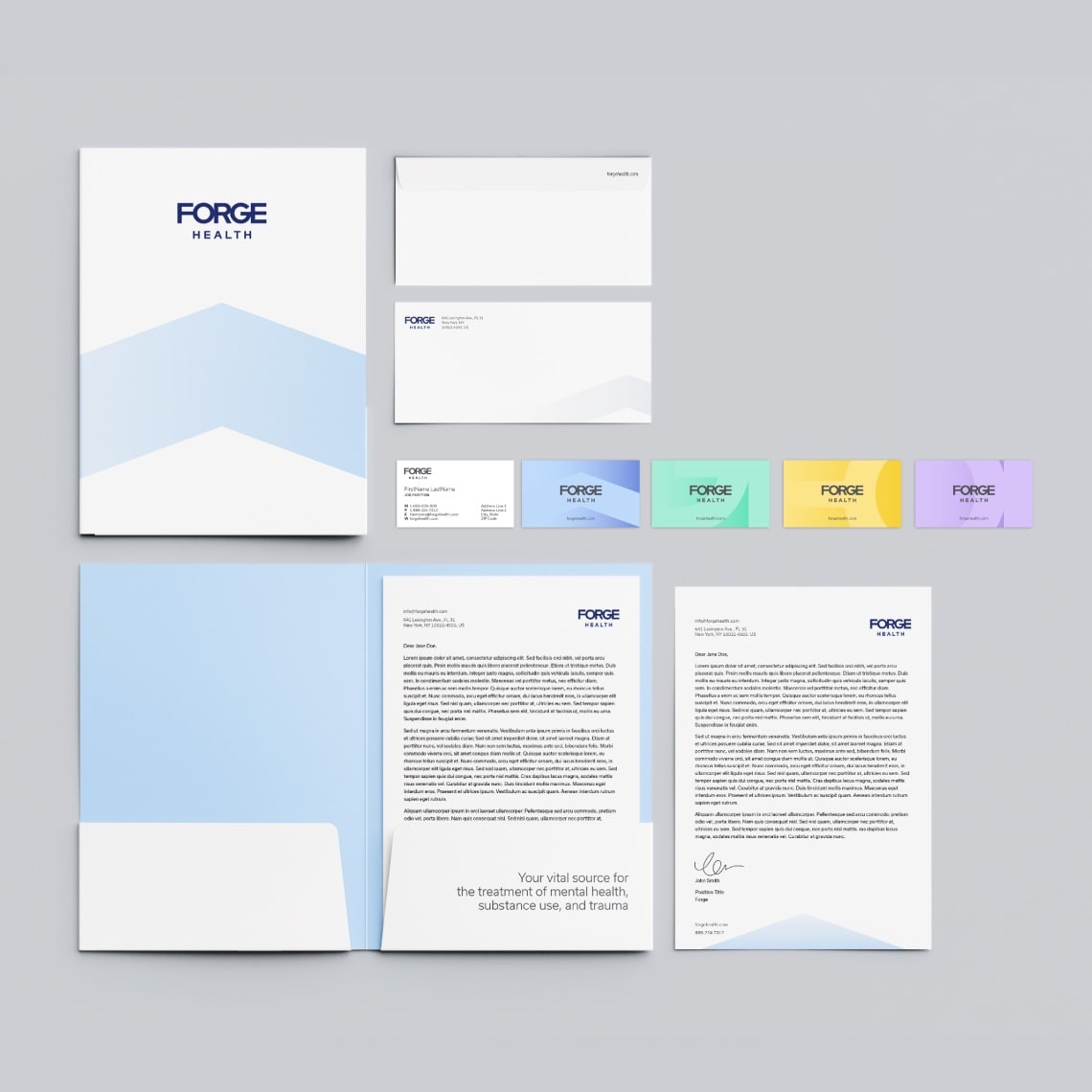 Examples of printed material including letterhead, envelope, business cards and folders