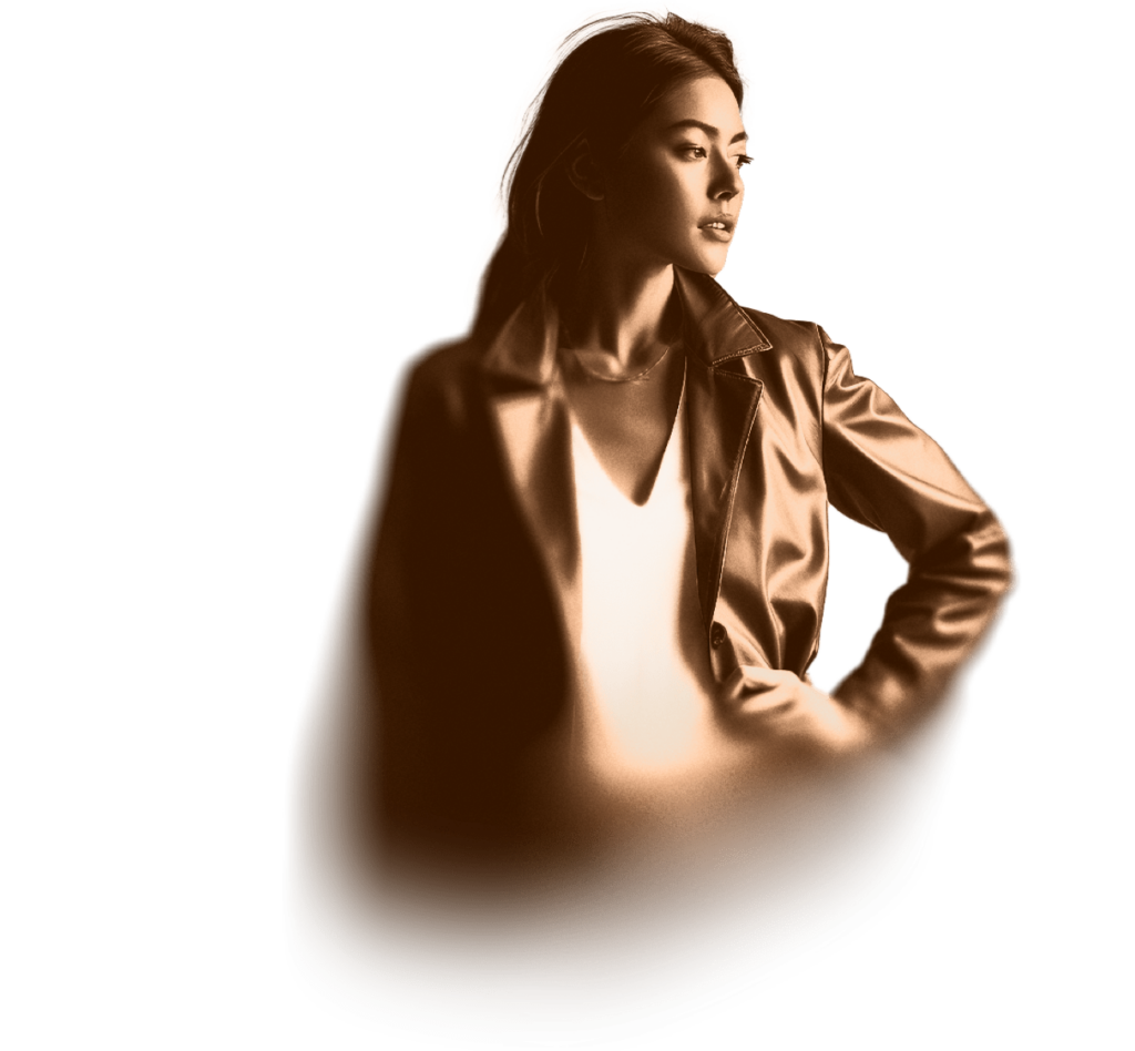 a young woman looking at her clothes in a mirror