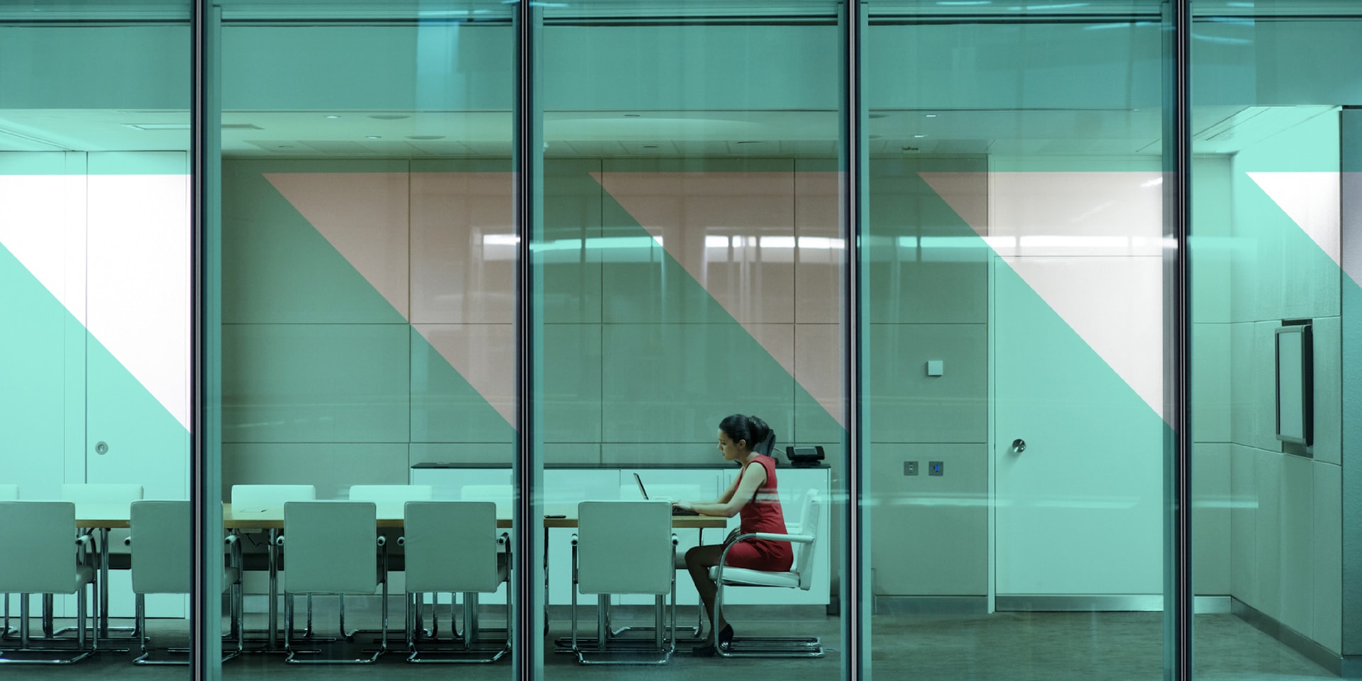 3Pillar's design system applied to the glass wall of an office