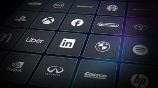A grid of dark tiles featuring various company logos, including Facebook, LinkedIn, Uber, BMW, Nintendo, and others.