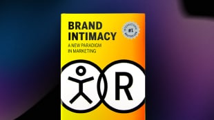 The cover of the book "Brand Intimacy: A New Paradigm in Marketing" with abstract icons on a yellow-orange gradient background.